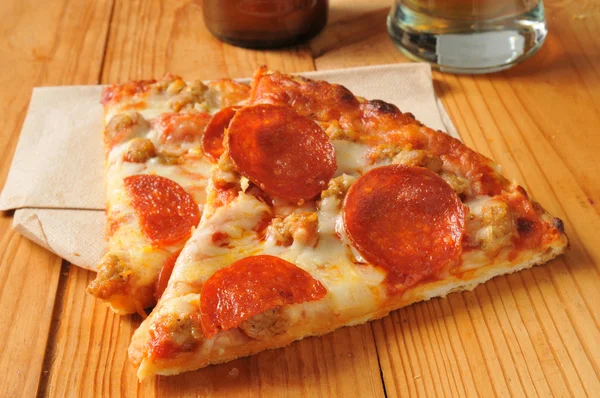 Pepperoni and sausage pizza — Stock Photo, Image