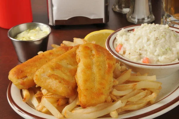 Fish and chips with coleslaw — Stock Photo, Image