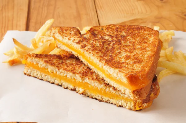 Grilled cheese sandwich with fries — Stock Photo, Image