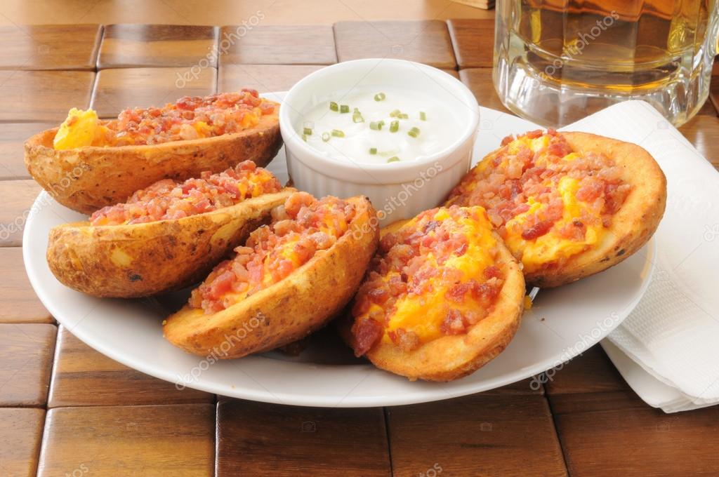 Potato skins iwth bacon and cheese Stock Photo by ©MSPhotographic 35615197
