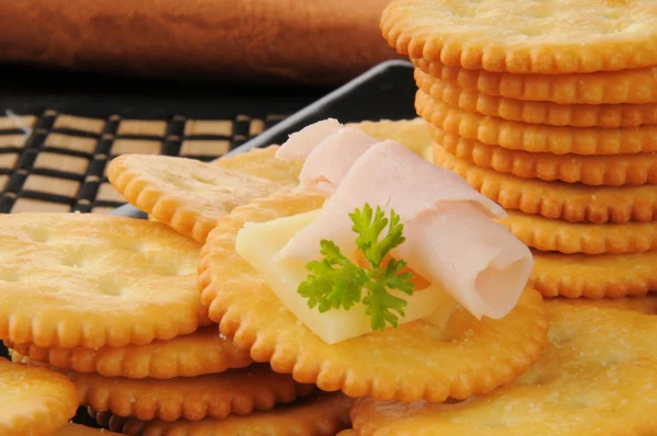 Crackers with ham and cheese — Stock Photo, Image