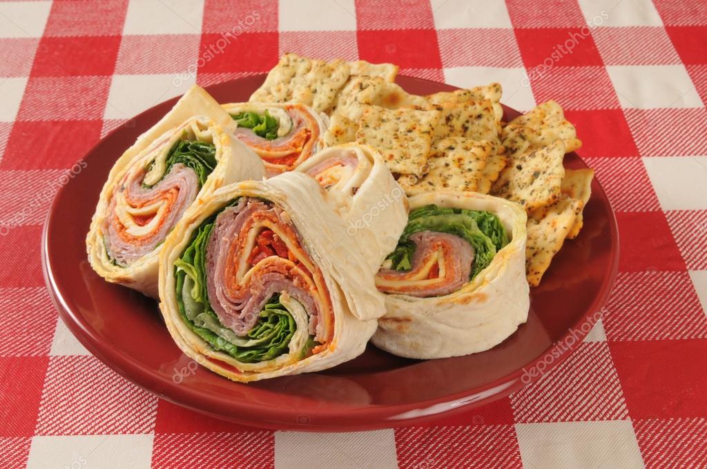 Wrap sandwich wiht Italian meats and cheeses — Stock Photo © MSPhotographic 40819695