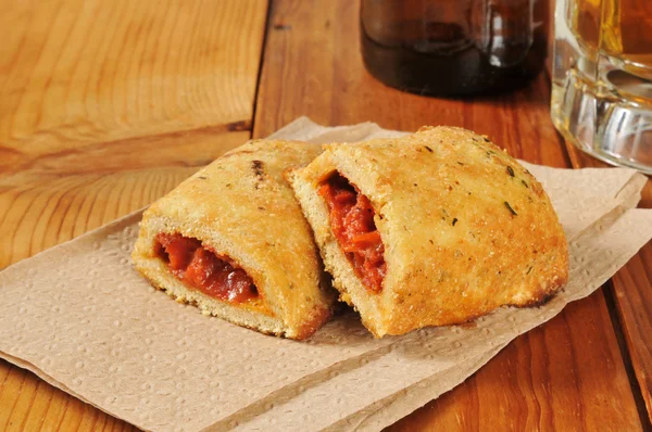Min calzones and beer — Stock Photo, Image