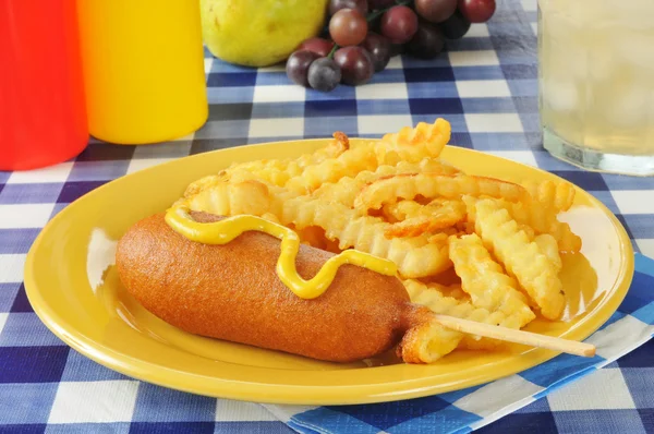 Corn dog and fries — Stock Photo, Image