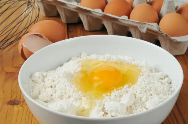 Eggs and baking mix — Stock Photo, Image