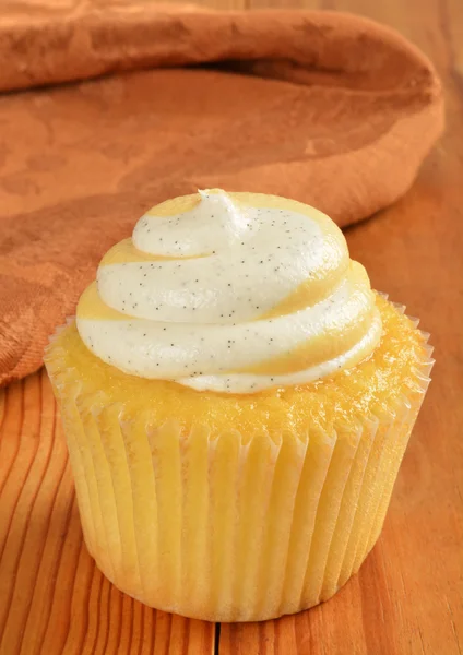 A cupcake with peach filling — Stock Photo, Image