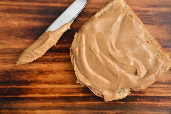 Peanut Butter Slice Bread Ona Wooden Table Overhead View — Stock Photo, Image