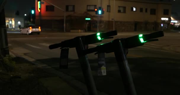 City Street Night Handlebars Electric Scooters Foreground — Stock Video