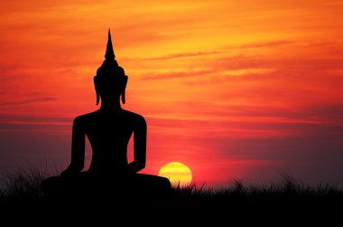 Buddha at sunset clipart