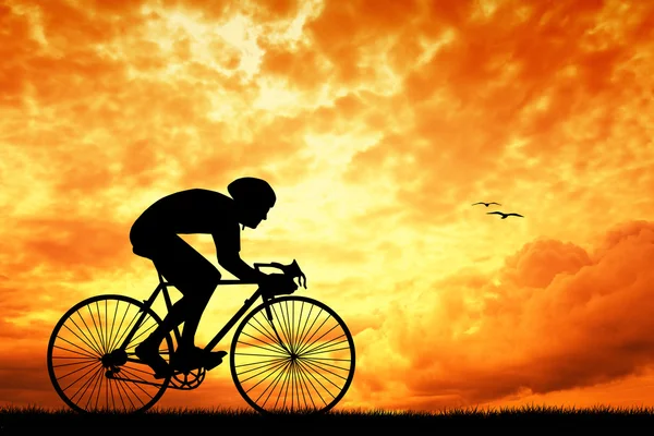 Biker bei Sonnenuntergang — Stockfoto