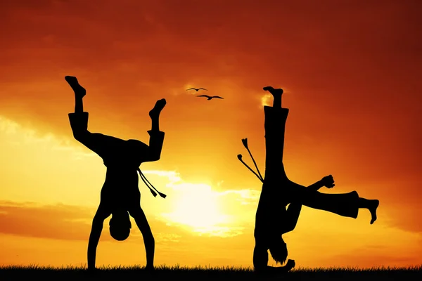 Capoeira silhouette at sunset — Stock Photo, Image