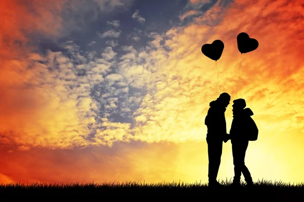 Pareja con globos cardíacos — Foto de Stock