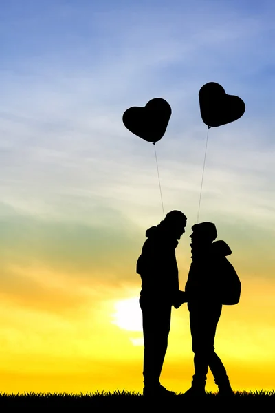 Pareja con globos cardíacos —  Fotos de Stock