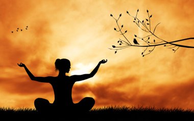 Gün batımında Yoga