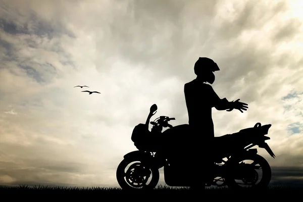 Motorcyclist at sunset — Stock Photo, Image