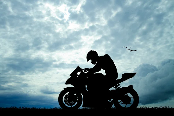 Motorcyclist at sunset — Stock Photo, Image