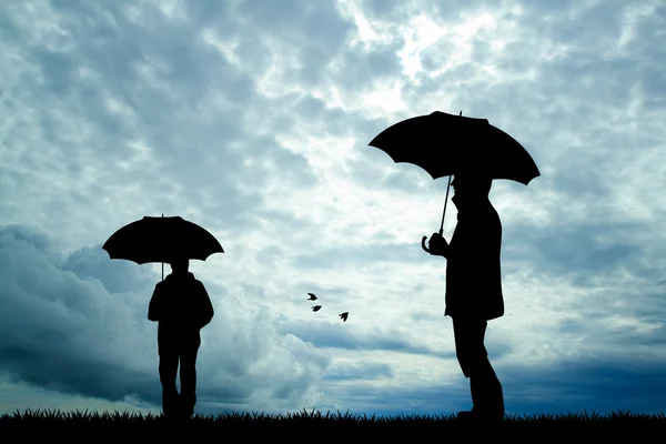 Persone con ombrello — Foto Stock