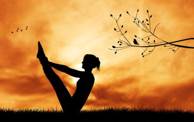 Gün batımında Yoga