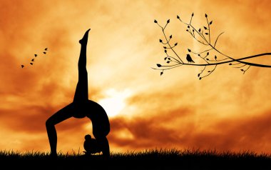 Gün batımında Yoga