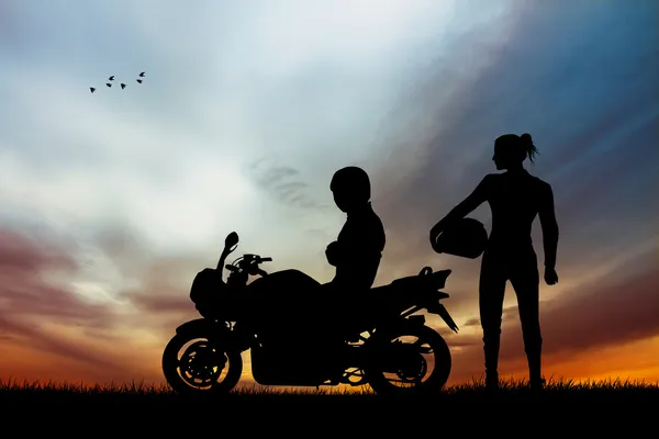 Motorradfahrerpaar — Stockfoto