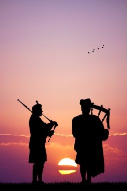 Pipers at sunset clipart