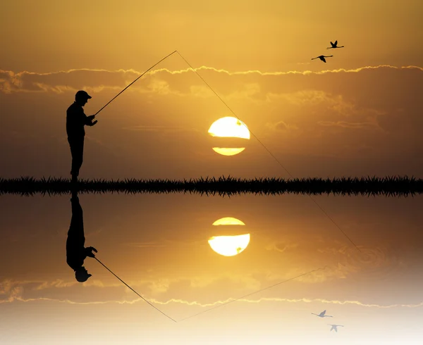 Visser bij zonsondergang — Stockfoto