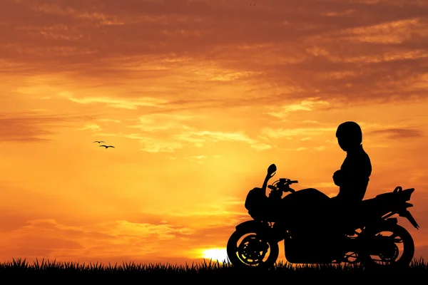 Motociclista al tramonto — Foto Stock