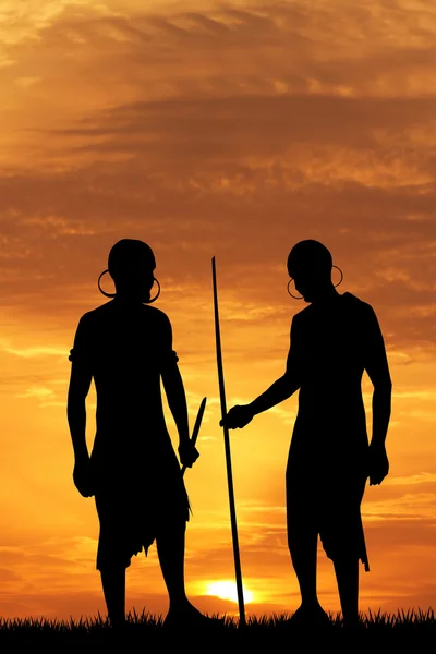 Indigenous men at sunset — Stock Photo, Image