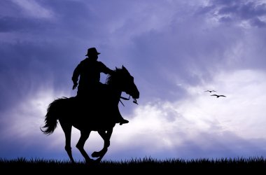gün batımında Man rides