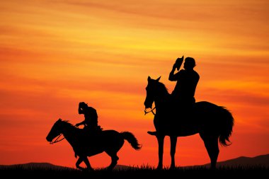 gün batımında Man rides