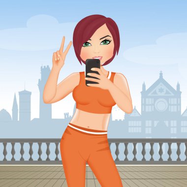 Selfie çeken bir kızın resmi.