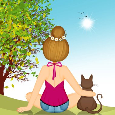 girl sitting with cat looks at the summer landscape