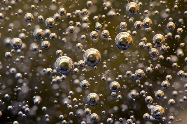 Contexte. Bulles dans un liquide. Macro — Photo