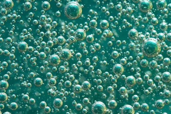 Antecedentes Burbujas en un líquido. Macro — Foto de Stock