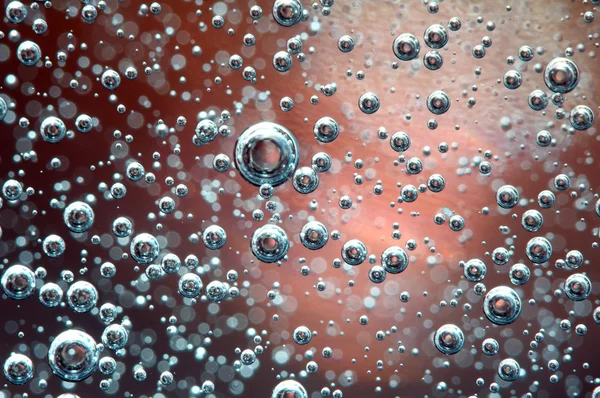 Luftblasen in einer Flüssigkeit. Abstrakter Hintergrund. Makro — Stockfoto