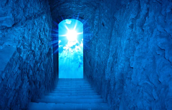 Jesus Christ is risen. Exit from the cave, stairs up, sun with rays. Biblical story concept. Easter.