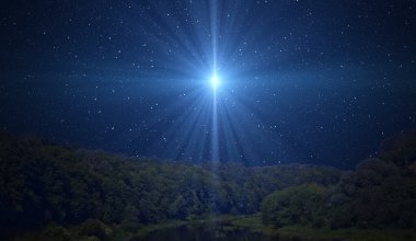 Beytüllahim Yıldızı, ya da gece ormanı üzerindeki Noel Yıldızı. Parlak bir yıldız, yıldızlı gökyüzünde İsa 'nın doğuşunu gösterir..
