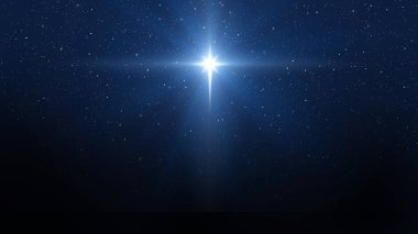 Koyu mavi gökyüzü ve parlak yıldızın arkaplanı. Beytüllahim 'in doğuşunun Noel yıldızı, İsa' nın doğuşu.