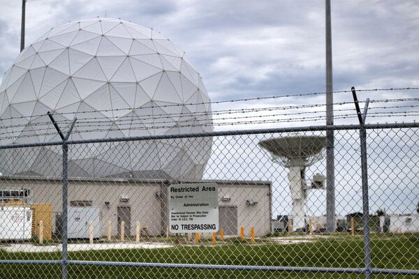 Launch Tracking Station with Geodesic Radome Against a Darkening Sky