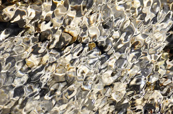 Deniz yatağı. kumlu alt yansıtılmış okyanus dalgalarının yansıması — Stok fotoğraf