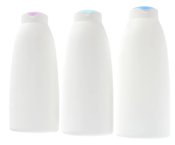 Tre bottiglie con mezzi cosmetici per uno sfondo bianco . — Foto Stock
