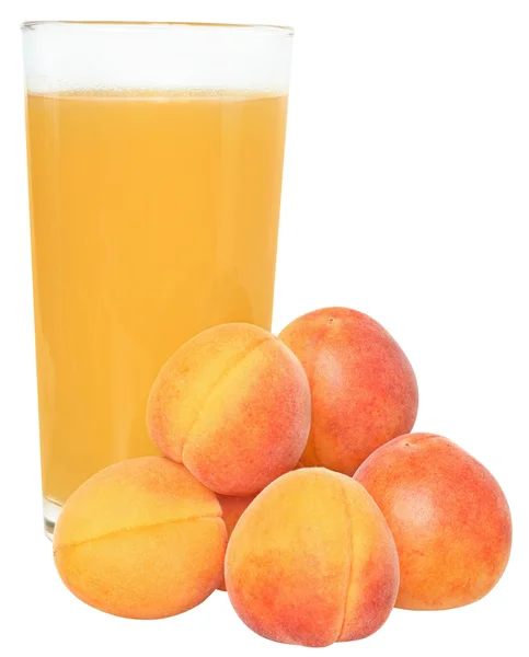 Abrikoos SAP met een hoop van perziken — Stockfoto
