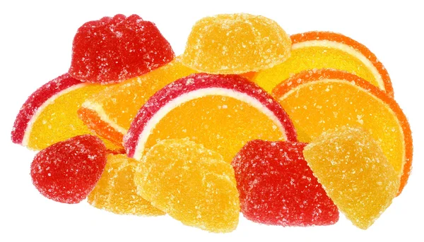 Pilha de laranja e doces amarelos — Fotografia de Stock
