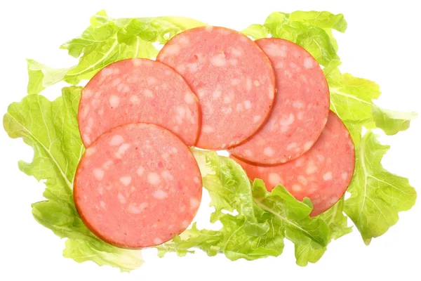 Sliced sausage with salad top view Stock Photo
