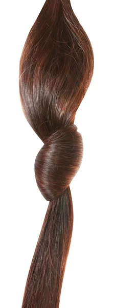 Женские волосы завязаны в узел — стоковое фото