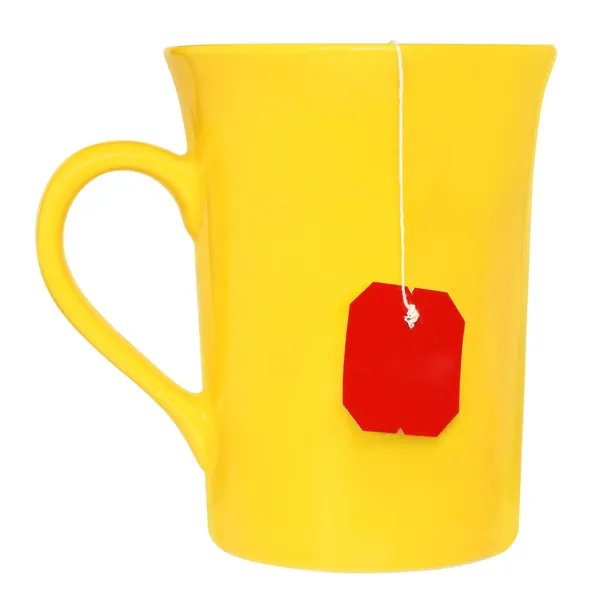 Żółty kubek z torebki herbaty wewnątrz — Zdjęcie stockowe