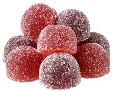 Beyaz bir arka plan üzerinde yakın kırmızı ve turuncu şeker Avuç.