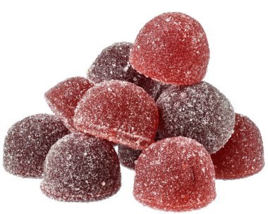 Beyaz bir arka plan üzerinde yakın kırmızı ve turuncu şeker Avuç.