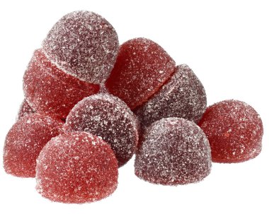 Beyaz bir arka plan üzerinde yakın kırmızı ve turuncu şeker Avuç.