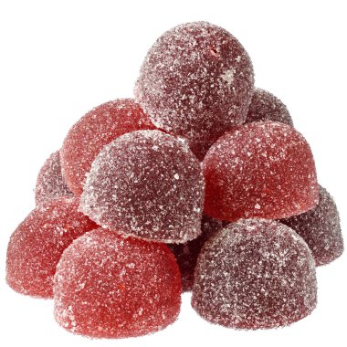 Beyaz bir arka plan üzerinde yakın kırmızı ve turuncu şeker Avuç.